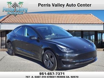 2021 Tesla Model 3 Long Range in a Black exterior color and Blackinterior. Perris Valley Kia 951-657-6100 perrisvalleykia.com 
