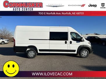 2024 RAM ProMaster Cargo Van SLT in a Bright White Clear Coat exterior color and Blackinterior. Cornhusker Auto Center 402-866-8665 cornhuskerautocenter.com 