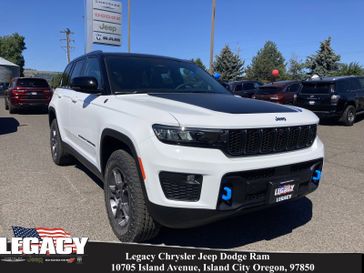 2023 Jeep Grand Cherokee Trailhawk Carb State Edition 4xe in a Bright White Clear Coat exterior color and Global Blackinterior. Legacy Chrysler Jeep Dodge RAM 541-663-4885 legacychryslerjeepdodgeram.com 