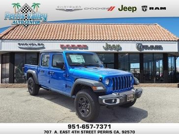 2023 Jeep Gladiator Sport 4x4 in a Hydro Blue Pearl Coat exterior color and Blackinterior. Perris Valley Chrysler Dodge Jeep Ram 951-355-1970 perrisvalleydodgejeepchrysler.com 