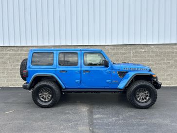 2024 Jeep Wrangler 4-door Rubicon 392 Final Edition in a Hydro Blue Pearl Coat exterior color and Blackinterior. Wilmington Auto Center Chrysler Dodge Jeep Ram (937) 556-6430 wilmingtonautocentercdjr.com 