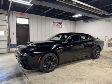 New 2026 Dodge Charger R/T 4-door Awd in a Diamond Black Crystal Pearl Coat exterior color and Blackinterior. Jensen Chrysler Dodge Jeep Ram 507-354-0542 jensenchryslerdodgejeepram.com 