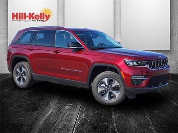 2022 Jeep Grand Cherokee 4xe in a Velvet Red Pearl Coat exterior color and Global Blackinterior. Hill-Kelly Dodge (850) 786-2130 hillkellydodge.com 