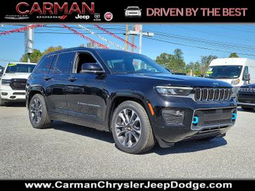 2023 Jeep Grand Cherokee Overland 4xe in a Diamond Black Crystal Pearl Coat exterior color and Global Black - BLX7interior. Carman Chrysler Jeep Dodge Ram 302-317-2378 carmanchryslerjeepdodge.com 