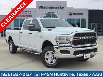 2024 RAM 2500 Tradesman Crew Cab 4x4 8' Box in a Bright White Clear Coat exterior color and Blackinterior. Wischnewsky Dodge 936-755-5310 wischnewskydodge.com 