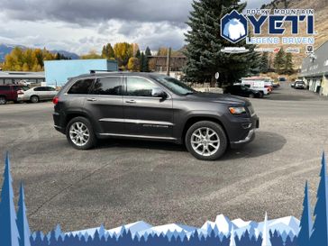 2014 Jeep Grand Cherokee Summit in a Granite Crystal Metallic Clear Coat exterior color and Blackinterior. Rocky Mountain Yeti Jackson Hole 307-733-5337 rockymountainyetijacksonhole.com 