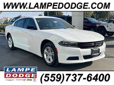 2023 Dodge Charger SXT Rwd in a White Knuckle exterior color and Blackinterior. Lampe Chrysler Dodge Jeep RAM 559-471-3085 pixelmotiondemo.com 