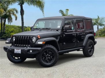 Used 2021 Jeep Wrangler Unlimited Willys Sport 4x4 in a Black Clear Coat exterior color and Blackinterior. Southbay Chrysler Jeep Dodge Ram (424) 404-5521 pixelmotiondemo.com 