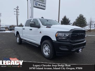 2024 RAM 3500 Tradesman Crew Cab 4x4 6'4' Box in a Bright White Clear Coat exterior color and Blackinterior. Legacy Chrysler Jeep Dodge RAM 541-663-4885 legacychryslerjeepdodgeram.com 