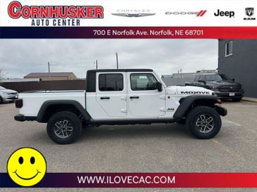 2024 Jeep Gladiator Mojave in a Bright White Clear Coat exterior color and A5X9interior. Cornhusker Auto Center 402-866-8665 cornhuskerautocenter.com 