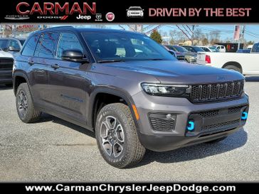 2024 Jeep Grand Cherokee Trailhawk 4xe in a Baltic Gray Metallic Clear Coat exterior color and Global Blackinterior. Carman Chrysler Jeep Dodge Ram 302-317-2378 carmanchryslerjeepdodge.com 