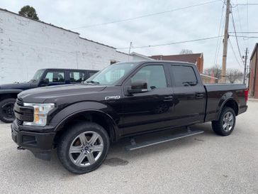 2018 Ford F-150 Lariat in a BLACK exterior color and BLACKinterior. Hometown Motors of Rockwell City 712-220-7644 hometownmotorsrc.com 
