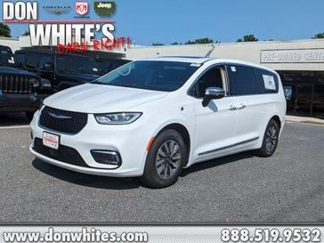 2023 Chrysler Pacifica Plug-In Hybrid Limited in a Bright White Clear Coat exterior color and Black/Alloy/Blackinterior. Don White's Timonium Chrysler Dodge Jeep Ram 410-881-5409 donwhites.com 