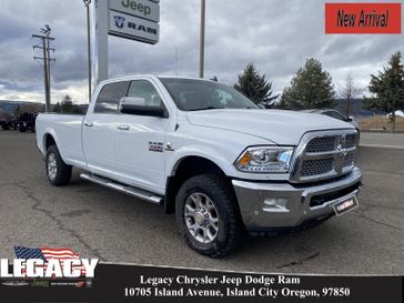 2018 RAM 3500 Laramie in a Bright White Clear Coat exterior color and Lt Frost Beige/Browninterior. Legacy Chrysler Jeep Dodge RAM 541-663-4885 legacychryslerjeepdodgeram.com 