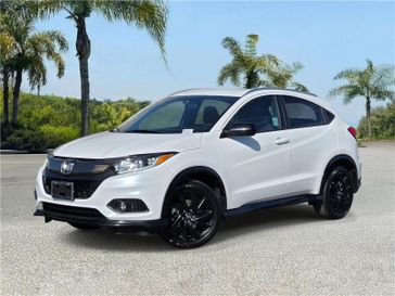 Used 2022 Honda HR-V Sport 2WD CVT in a Platinum White Pearl exterior color and Blackinterior. Southbay Chrysler Jeep Dodge Ram (424) 404-5521 pixelmotiondemo.com 