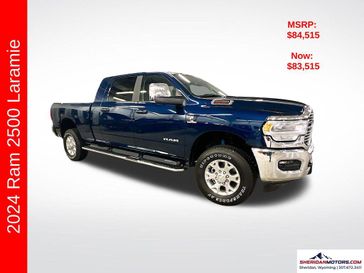 2024 RAM 2500 Laramie Mega Cab 4x4 6'4' Box in a Patriot Blue Pearl Coat exterior color and Blackinterior. Sheridan Motors CDJR 307-218-2217 sheridanmotor.com 