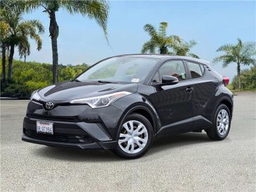 Used 2019 Toyota C-HR LE FWD (Natl) in a Black Sand Pearl exterior color and Redinterior. Champion Alfa Romeo 562-454-0632 championalfaromeo.com 