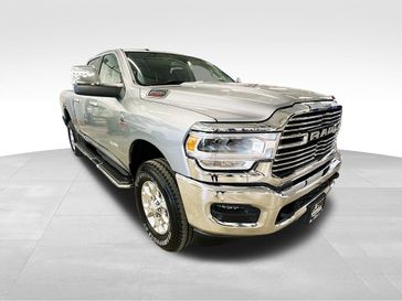 2024 RAM 2500 Laramie Crew Cab 4x4 6'4' Box in a Billet Silver Metallic Clear Coat exterior color and Blackinterior. Sheridan Motors CDJR 307-218-2217 sheridanmotor.com 