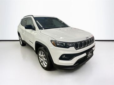 2024 Jeep Compass Latitude Lux 4x4 in a Bright White Clear Coat exterior color and Blackinterior. Sheridan Motors CDJR 307-218-2217 sheridanmotor.com 