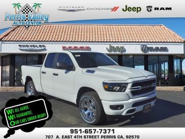 2024 RAM 1500 Tradesman Quad Cab 4x2 6'4' Box in a Bright White Clear Coat exterior color and Blackinterior. Perris Valley Chrysler Dodge Jeep Ram 951-355-1970 perrisvalleydodgejeepchrysler.com 