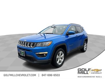 2021 Jeep Compass Latitude in a Laser Blue Pearl Coat exterior color and Blackinterior. Glenview Luxury Imports 847-904-1233 glenviewluxuryimports.com 