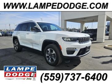 2024 Jeep Grand Cherokee 4xe in a Bright White Clear Coat exterior color and Global Blackinterior. Lampe Chrysler Dodge Jeep RAM 559-471-3085 pixelmotiondemo.com 