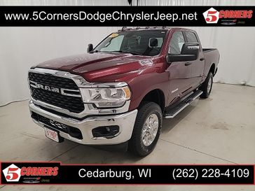 2024 RAM 2500 Big Horn in a Delmonico Red Pearl Coat exterior color and Diesel Gray/Blackinterior. 5 Corners Dodge Chrysler Jeep 262-228-4109 5cornersdodgechryslerjeep.net 