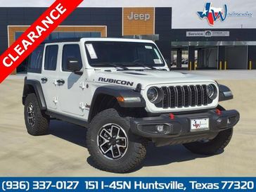 2024 Jeep Wrangler 4-door Rubicon in a Bright White Clear Coat exterior color. Wischnewsky Dodge 936-755-5310 wischnewskydodge.com 