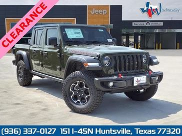 2023 Jeep Gladiator Rubicon 4x4 in a Sarge Green Clear Coat exterior color and Blackinterior. Wischnewsky Dodge 936-755-5310 wischnewskydodge.com 