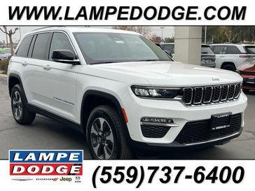 2024 Jeep Grand Cherokee 4xe in a Bright White Clear Coat exterior color and Global Blackinterior. Lampe Chrysler Dodge Jeep RAM 559-471-3085 pixelmotiondemo.com 