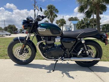 2024 Triumph Bonneville T100 in a COMPETITION GREEN exterior color. Euro Cycles of Daytona 386-257-2269 eurocyclesofdaytona.com 