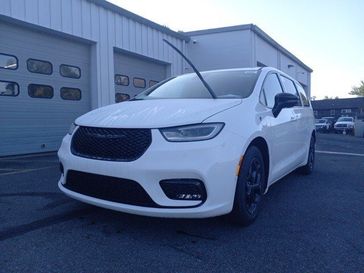 2023 Chrysler Pacifica Plug-in Hybrid Limited in a Bright White Clear Coat exterior color and Blackinterior. Garavel Jeep 475-258-7987 norwalkjeep.com 