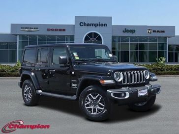 2024 Jeep Wrangler 4-door Sahara in a Black Clear Coat exterior color and CLOTHinterior. Champion Chrysler Jeep Dodge Ram 800-549-1084 pixelmotiondemo.com 