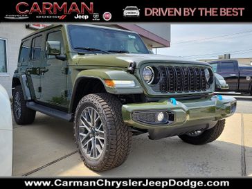 2024 Jeep Wrangler 4-door High Altitude 4xe in a Sarge Green Clear Coat exterior color and Black - KLX9interior. Carman Chrysler Jeep Dodge Ram 302-317-2378 carmanchryslerjeepdodge.com 