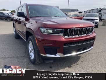 2023 Jeep Grand Cherokee L Laredo 4x4 in a Velvet Red Pearl Coat exterior color and Global Blackinterior. Legacy Chrysler Jeep Dodge RAM 541-663-4885 legacychryslerjeepdodgeram.com 