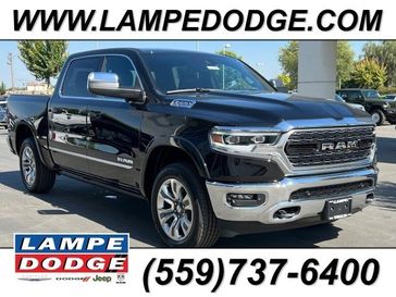 2023 RAM 1500 Limited Crew Cab 4x4 5'7' Box in a Diamond Black Crystal Pearl Coat exterior color. Lampe Chrysler Dodge Jeep RAM 559-471-3085 pixelmotiondemo.com 