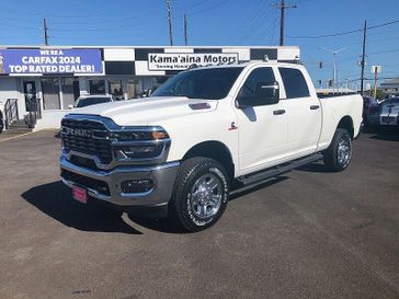 New 2026 RAM 2500 Tradesman Crew Cab 4x4 6'4' Box in a Bright White Clear Coat exterior color. Kamaaina Motors 1-808-746-7956 kamaainamotors.com 