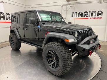 2023 Jeep Wrangler 4-door Sport S 4x4 in a Black Clear Coat exterior color and Blackinterior. Marina Auto Group (855) 564-8688 marinaautogroup.com 