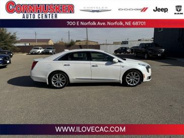 2018 Cadillac XTS Premium Luxury in a Crystal White Tri Coat exterior color and Shale with Jet Black accentsinterior. Cornhusker Auto Center 402-866-8665 cornhuskerautocenter.com 