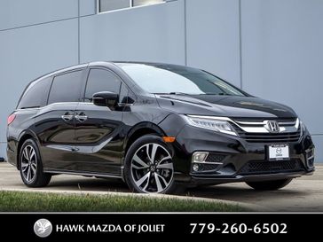 2019 Honda Odyssey Elite in a Black exterior color. Glenview Luxury Imports 847-904-1233 glenviewluxuryimports.com 