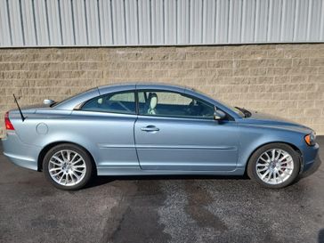 2007 Volvo C70 Base in a Celestial Blue Metallic exterior color and Calcite Creaminterior. Wilmington Auto Center Chrysler Dodge Jeep Ram (937) 556-6430 wilmingtonautocentercdjr.com 