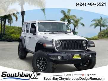 New 2026 Jeep Wrangler Willys in a White/off-white exterior color and Blackinterior. Southbay Chrysler Jeep Dodge Ram (424) 404-5521 pixelmotiondemo.com 