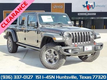 2023 Jeep Gladiator Rubicon 4x4 in a Granite Crystal Metallic Clear Coat exterior color and Blackinterior. Wischnewsky Dodge 936-755-5310 wischnewskydodge.com 