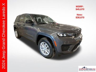 2024 Jeep Grand Cherokee Laredo X 4x4 in a Baltic Gray Metallic Clear Coat exterior color and Blackinterior. Sheridan Motors CDJR 307-218-2217 sheridanmotor.com 