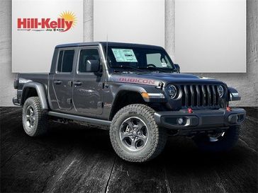 2023 Jeep Gladiator Rubicon 4x4 in a Granite Crystal Metallic Clear Coat exterior color and Blackinterior. Hill-Kelly Dodge (850) 786-2130 hillkellydodge.com 