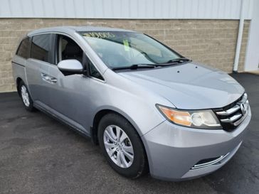 2016 Honda Odyssey EX-L in a Lunar Silver Metallic exterior color and Grayinterior. Wilmington Auto Center Chrysler Dodge Jeep Ram (937) 556-6430 wilmingtonautocentercdjr.com 