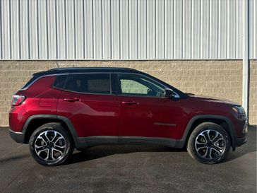 2022 Jeep Compass Limited in a Velvet Red Pearl Coat exterior color and Blackinterior. Wilmington Auto Center Chrysler Dodge Jeep Ram (937) 556-6430 wilmingtonautocentercdjr.com 