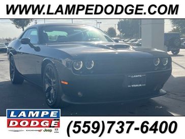 2023 Dodge Challenger R/T in a Pitch-Black exterior color and Blackinterior. Lampe Chrysler Dodge Jeep RAM 559-471-3085 pixelmotiondemo.com 