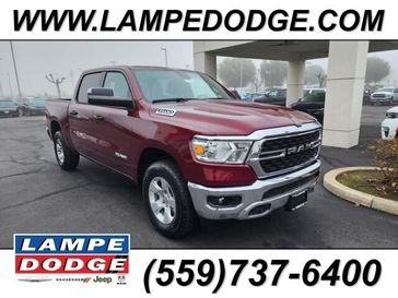 2024 RAM 1500 Big Horn Crew Cab 4x4 5'7' Box in a Delmonico Red Pearl Coat exterior color and Diesel Gray/Blackinterior. Lampe Chrysler Dodge Jeep RAM 559-471-3085 pixelmotiondemo.com 