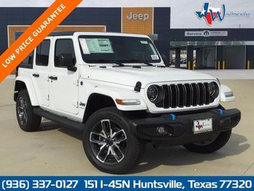 2024 Jeep Wrangler 4-door Sport S 4xe in a Bright White Clear Coat exterior color and Blackinterior. Wischnewsky Dodge 936-755-5310 wischnewskydodge.com 